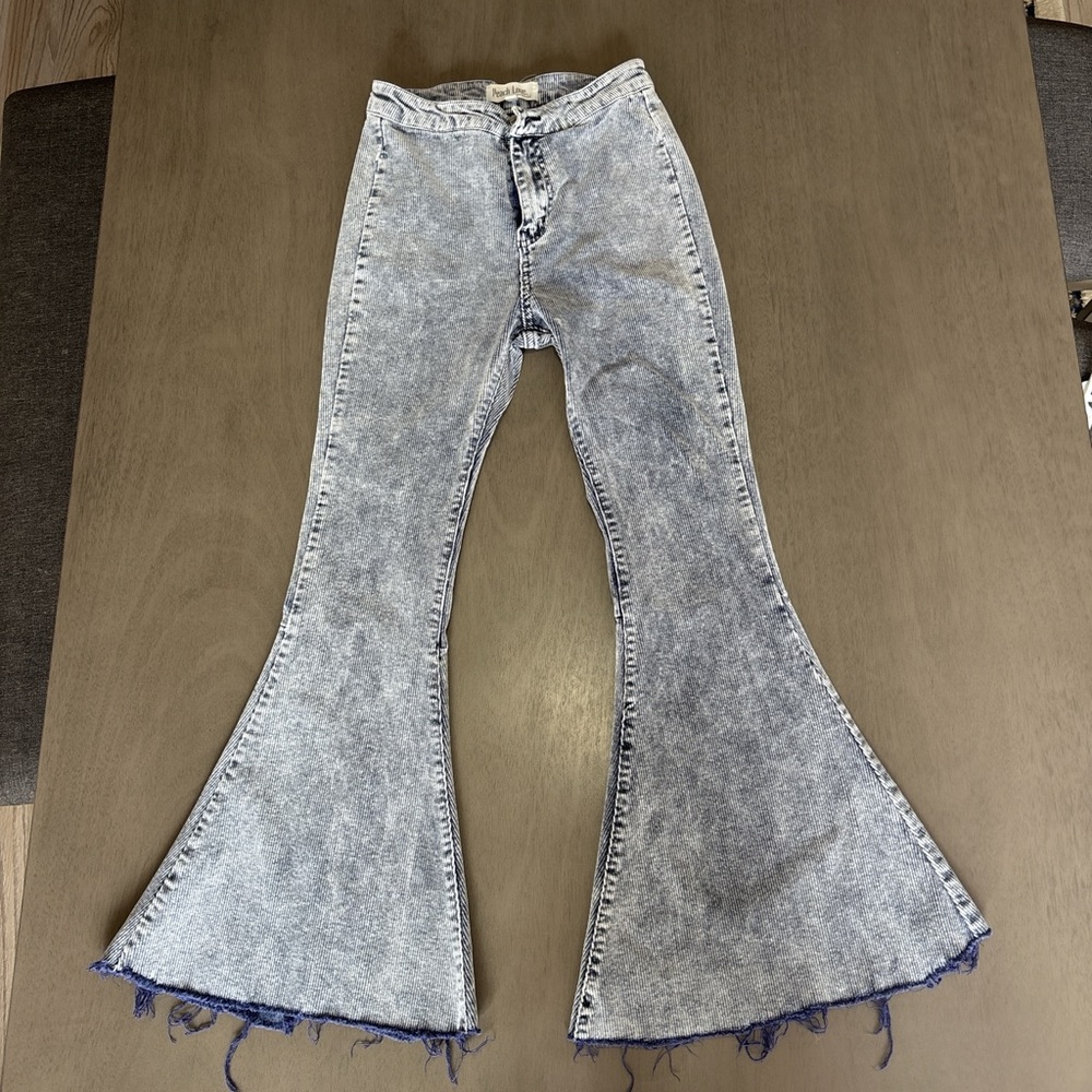 Corduroy acid wash flare jeans